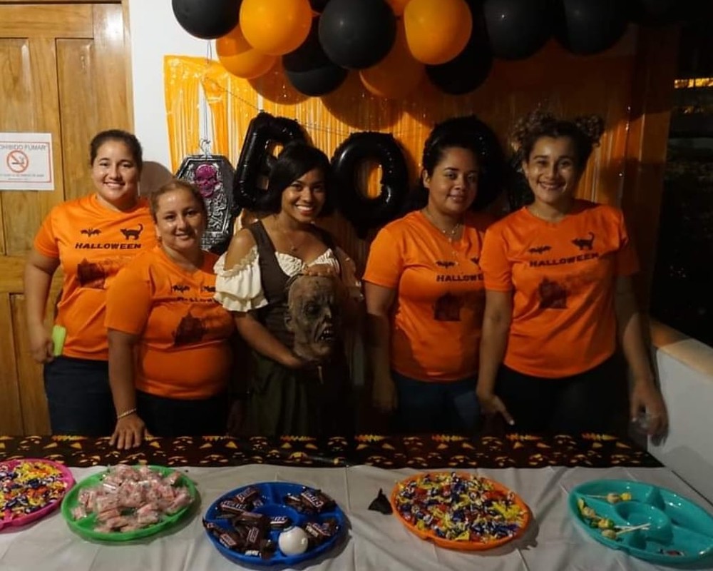 Los Buzos staff hosting a Halloween party today, continuing the school party tradition they grew up attending